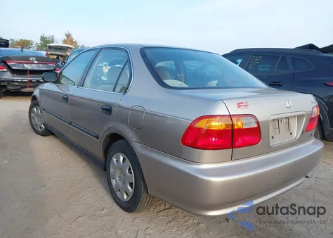 2000 Honda Civic Lx from USA, damaged, VIN 1HGEJ6579YL009061